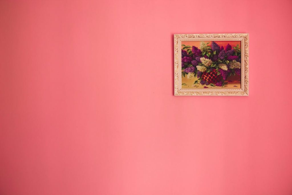 Pink and Yellow Flower Painting on a pink background wall