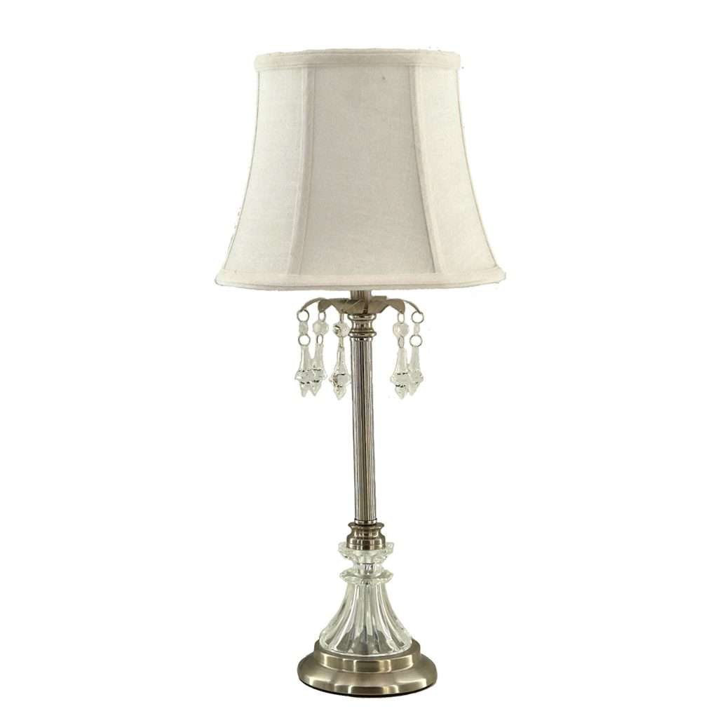 Elegant table lamp with a white lampshade.