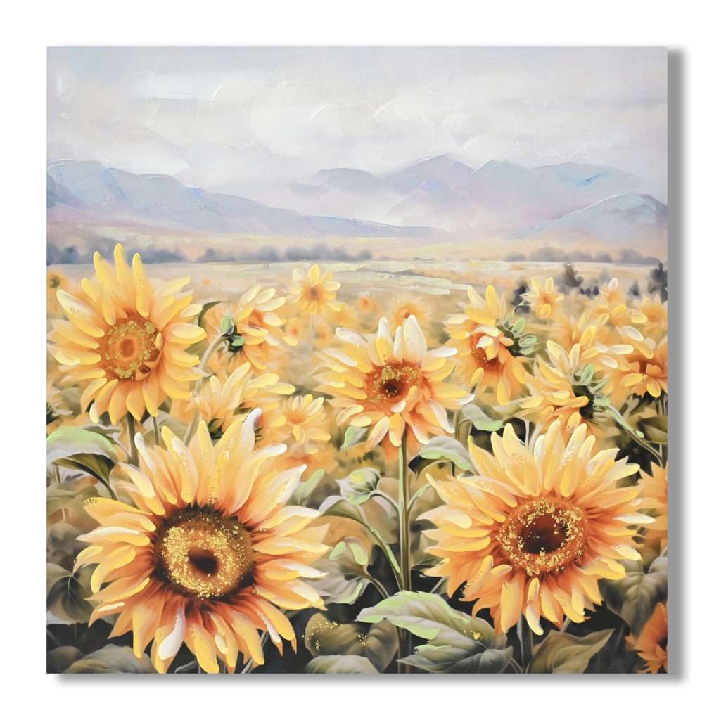 Sunflower field with mountains in background.