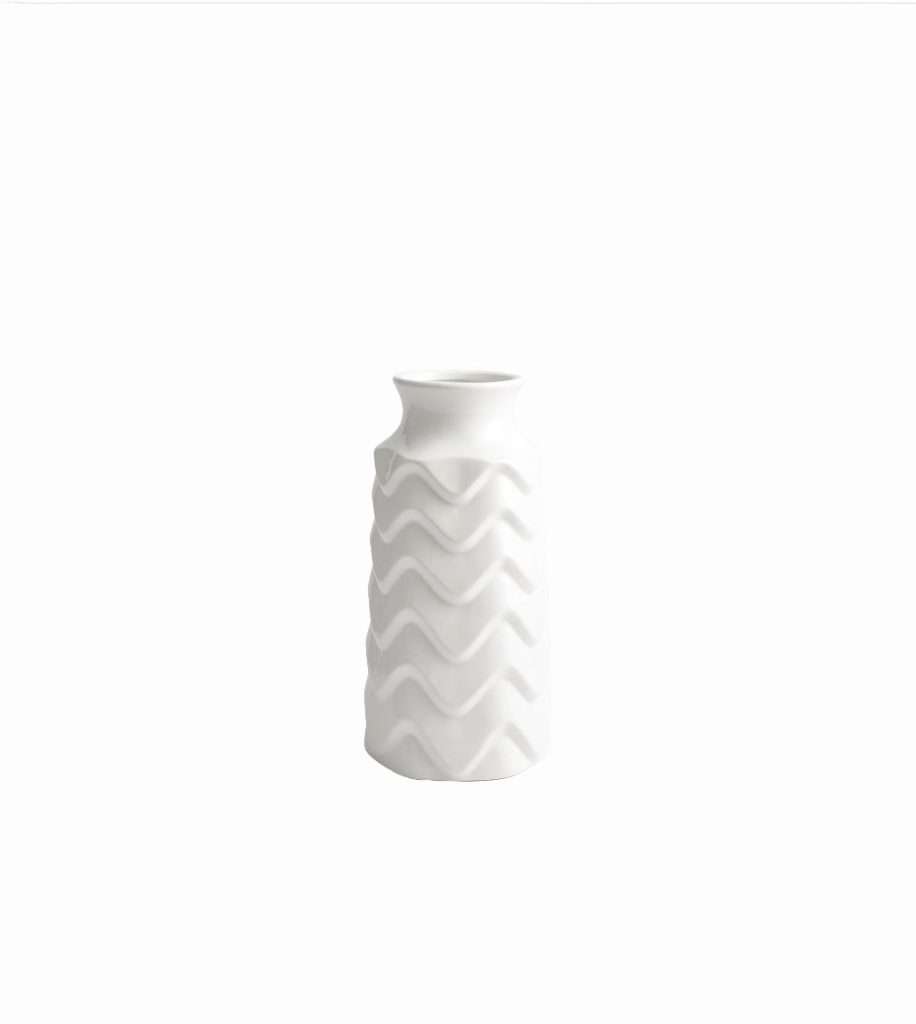 White ceramic vase with wave pattern