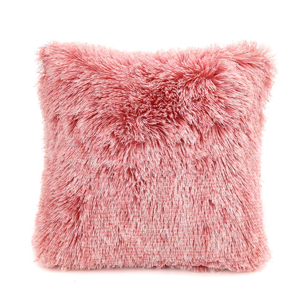 Soft pink fluffy cushion for home decor.