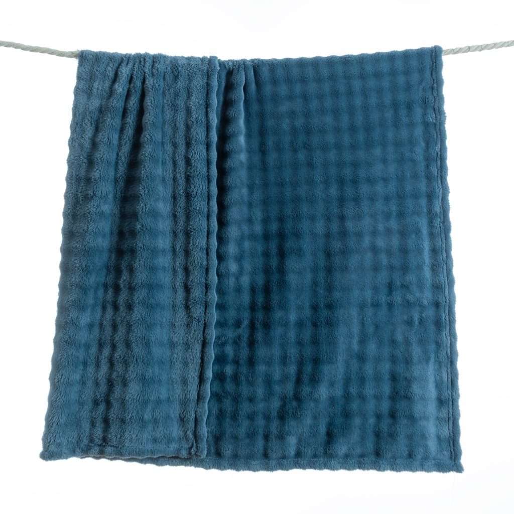 Blue fleece blanket on clothesline