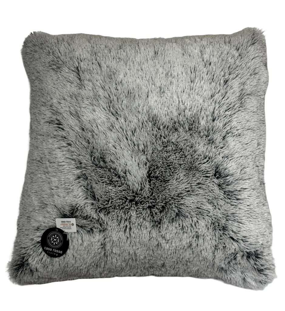 Soft grey fluffy cushion with tags.