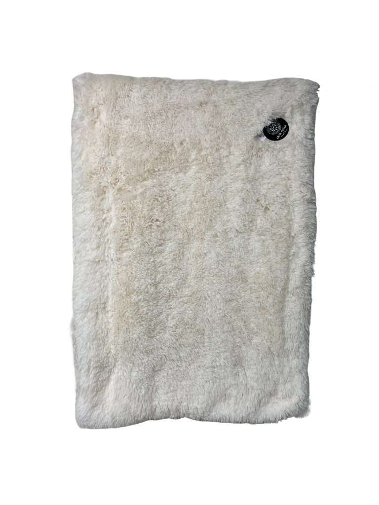 Soft white fluffy material with label