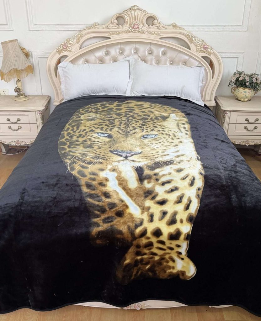 Elegant bedroom with leopard print blanket