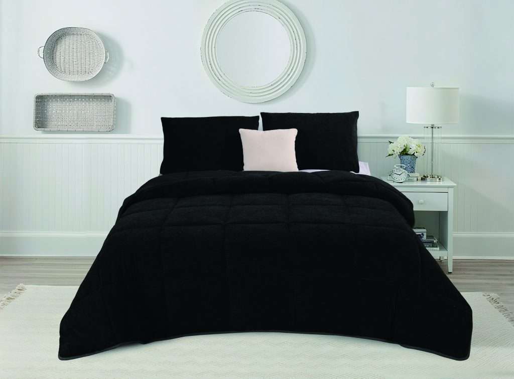 Elegant bedroom with black bedding