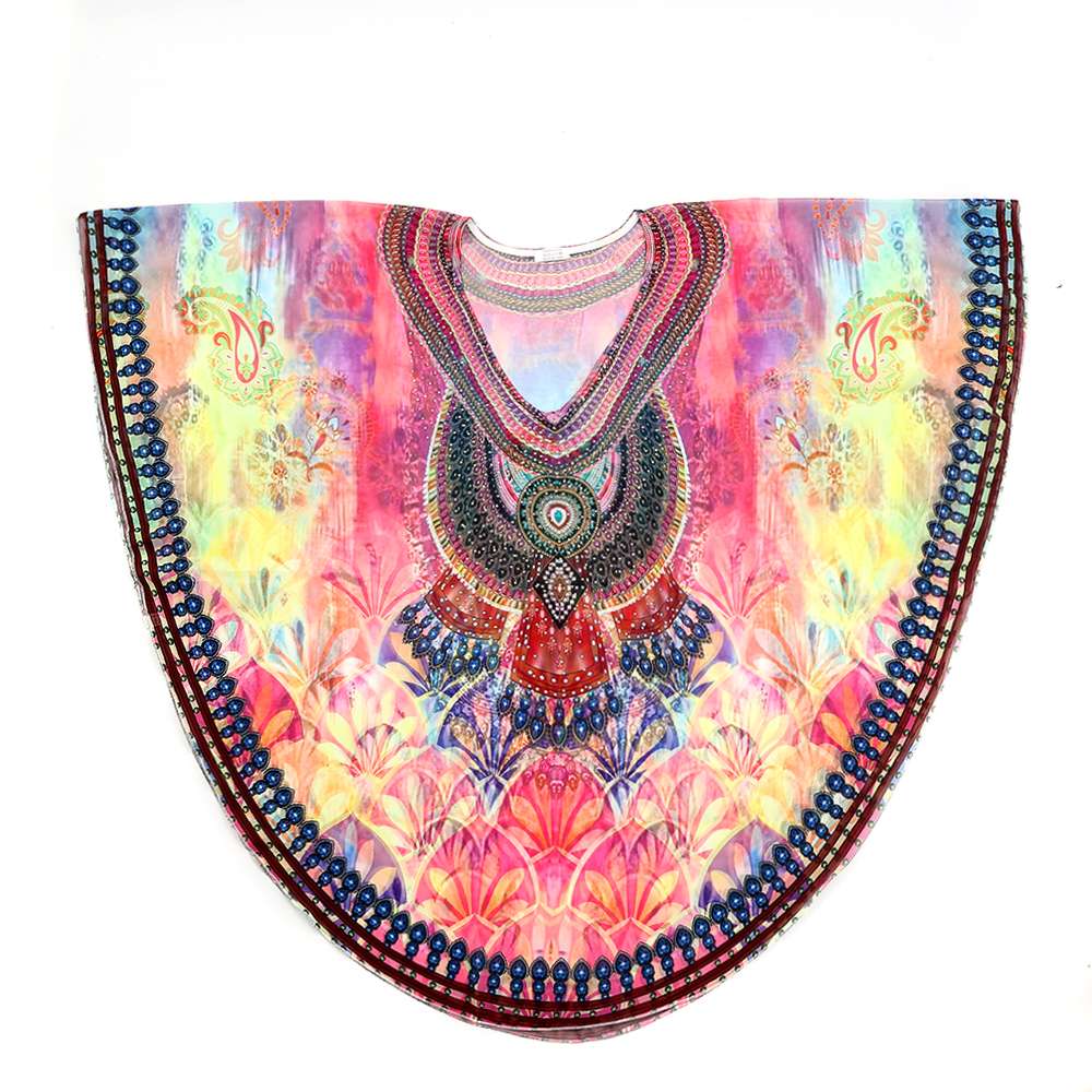 Colourful patterned kaftan with ornate jewel design