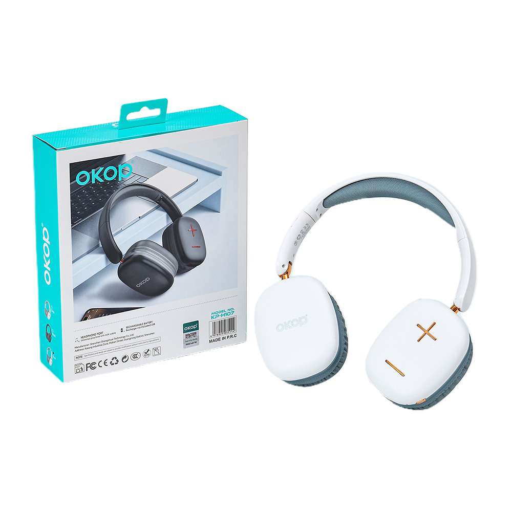 White OKOP wireless over-ear headphones beside retail box