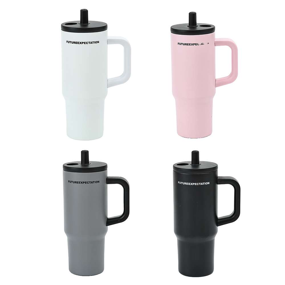 Four handled tumblers with straws in pastel and dark colours
