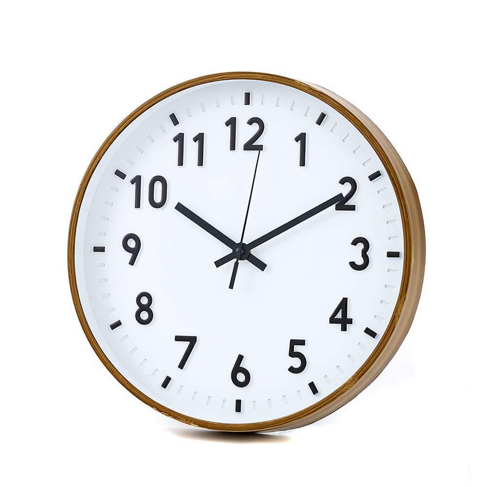 Gold-rimmed analogue clock showing ten past ten